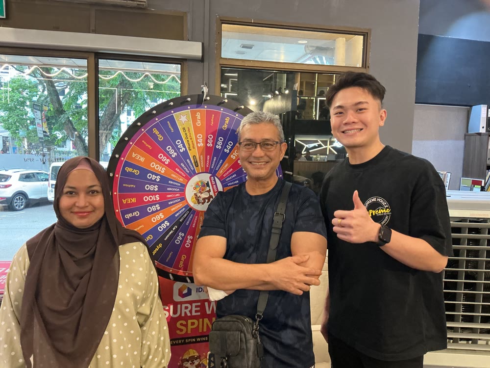 Family posing with their prize