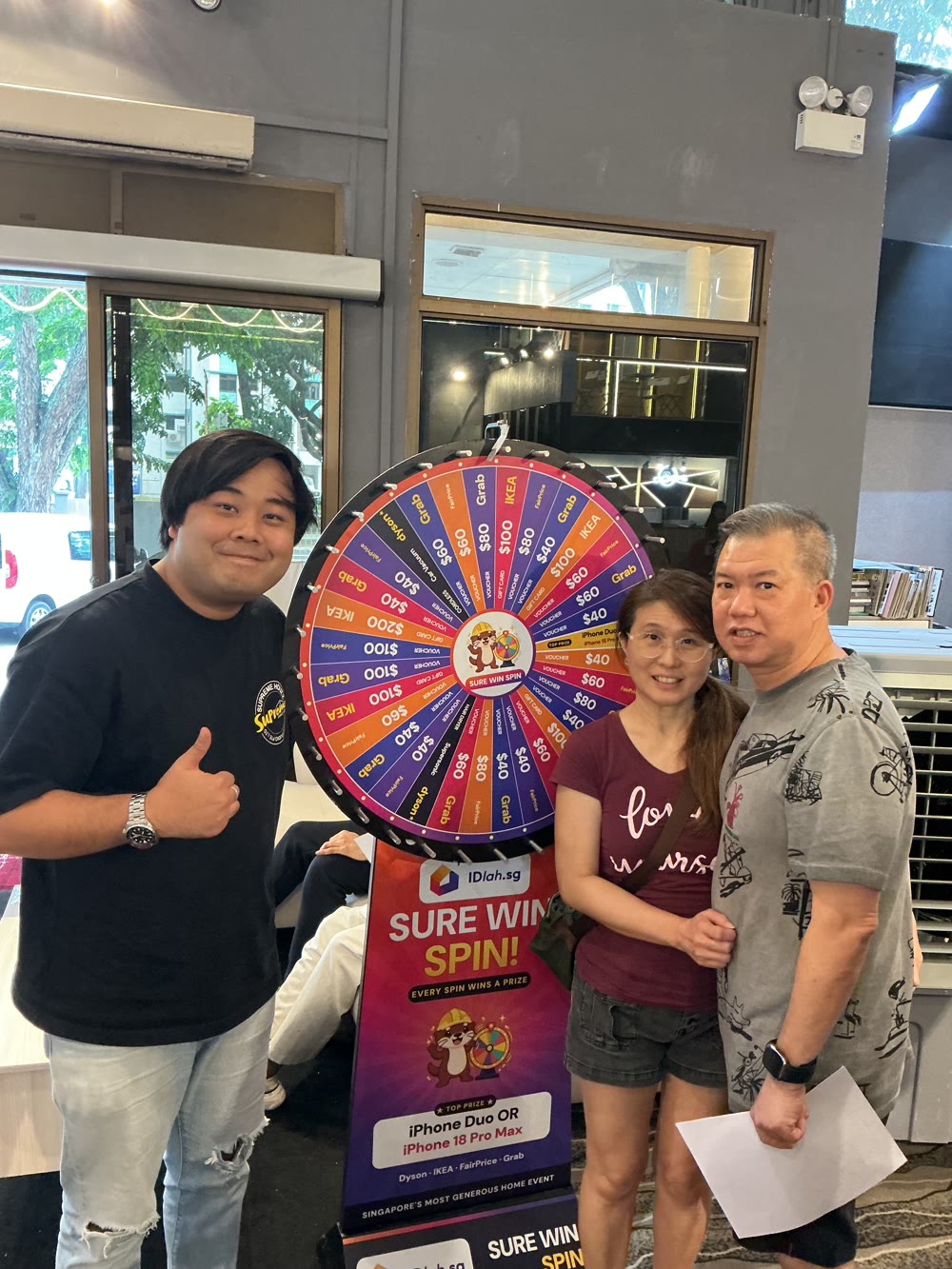 Young couple with the lucky wheel